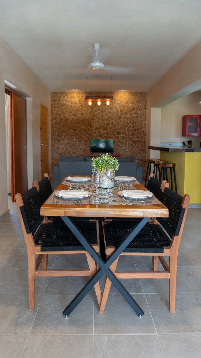 Comedor con vista al exterior en Kinila Apartments, Chicxulub Puerto