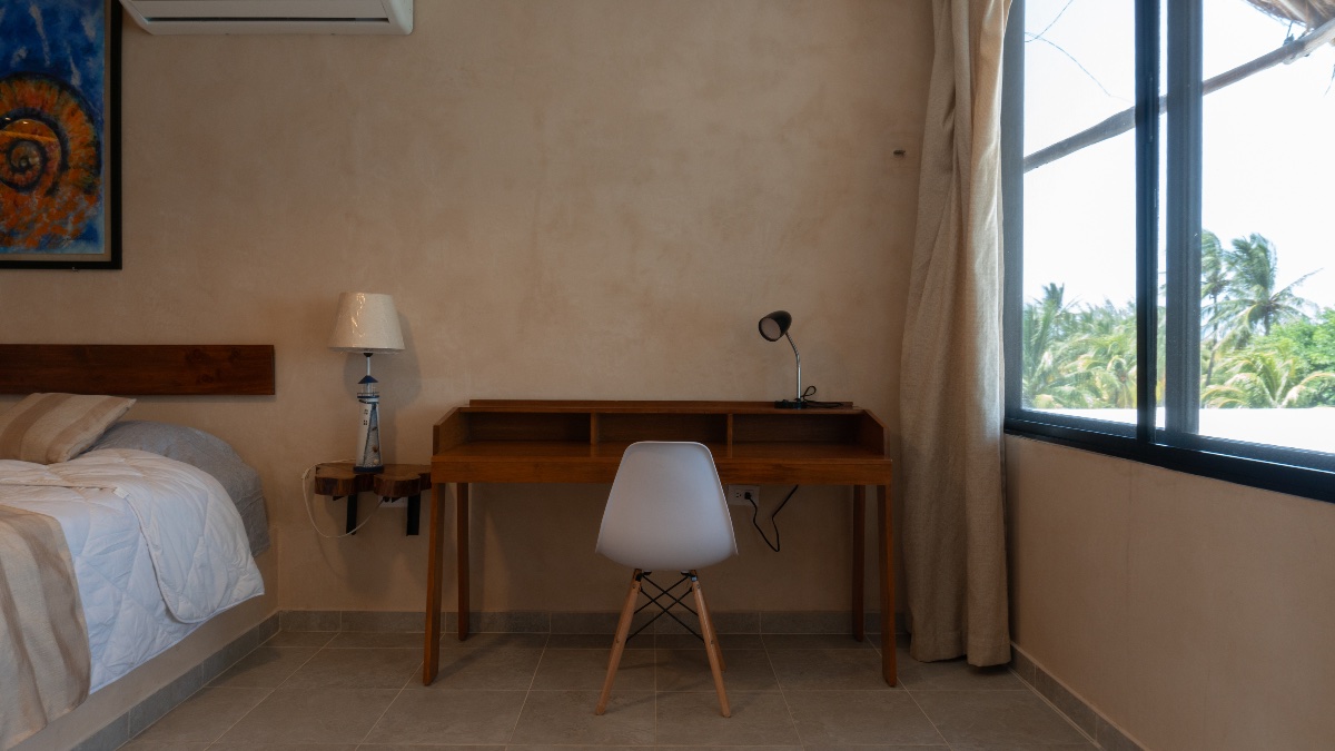 Área de trabajo con escritorio para nómadas digitales en Kinila Apartments, Progreso